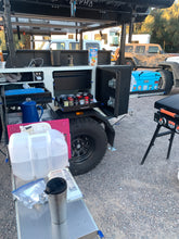Load image into Gallery viewer, Tribe Basecamp Overland Trailer. Picture of kitchen area set up at basecamp.