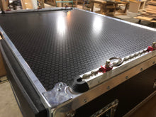 Load image into Gallery viewer, Overland Vehicle Storage system for SUV, Jeep JK / JL, 4Runner. View of  top and side of case,  Marine Grade Baltic Birch construction with hexa-pattern phenolic resin finish, Full aluminum extrusion at all sides with steel reinforced corners, Aircraft Style Cargo Tie Downs.